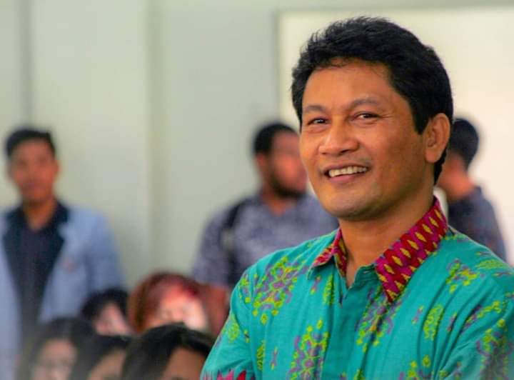 ELVIS UMBU LOLO, M.T.